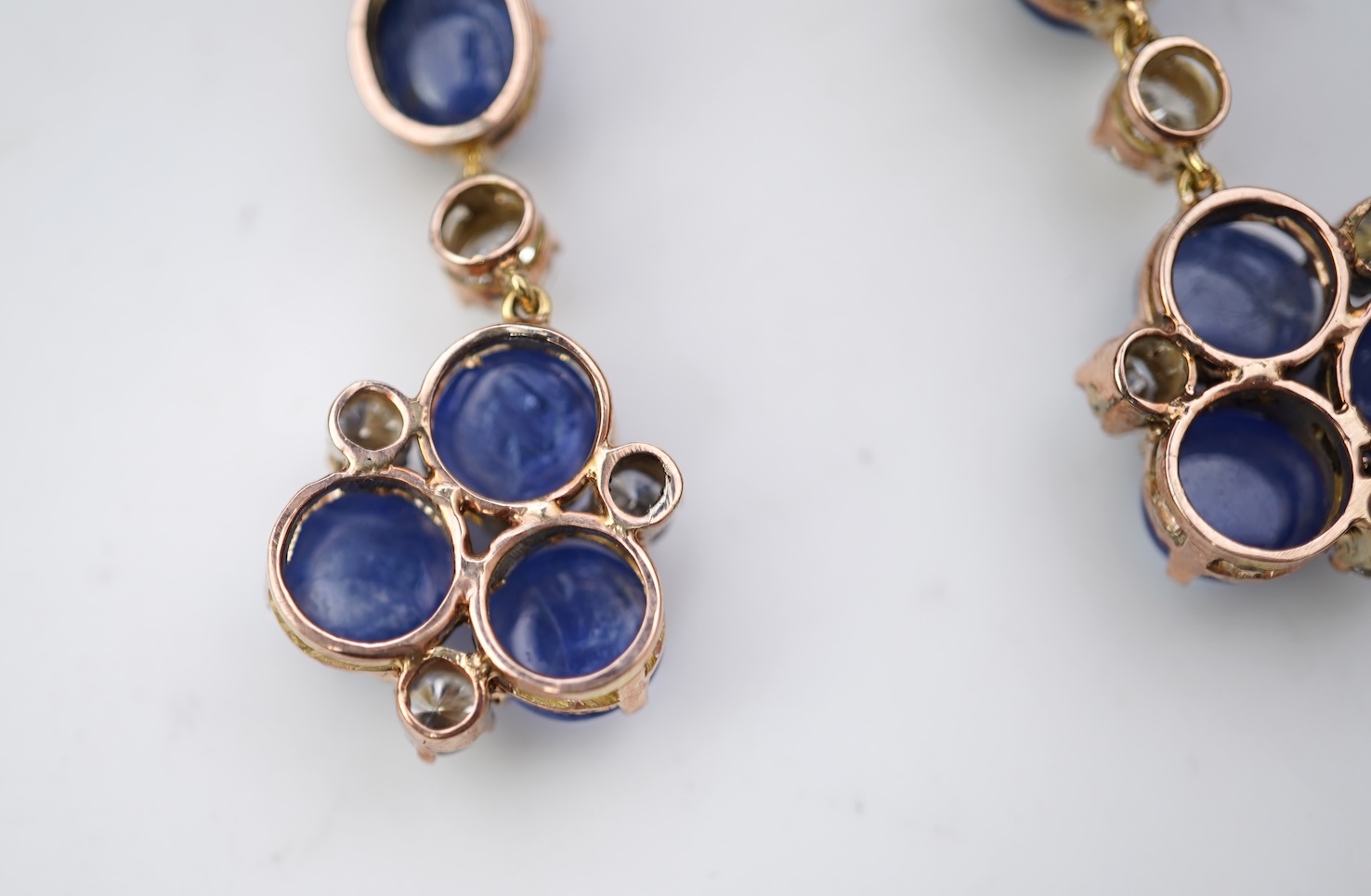 A pair of sapphire and diamond drop earrings